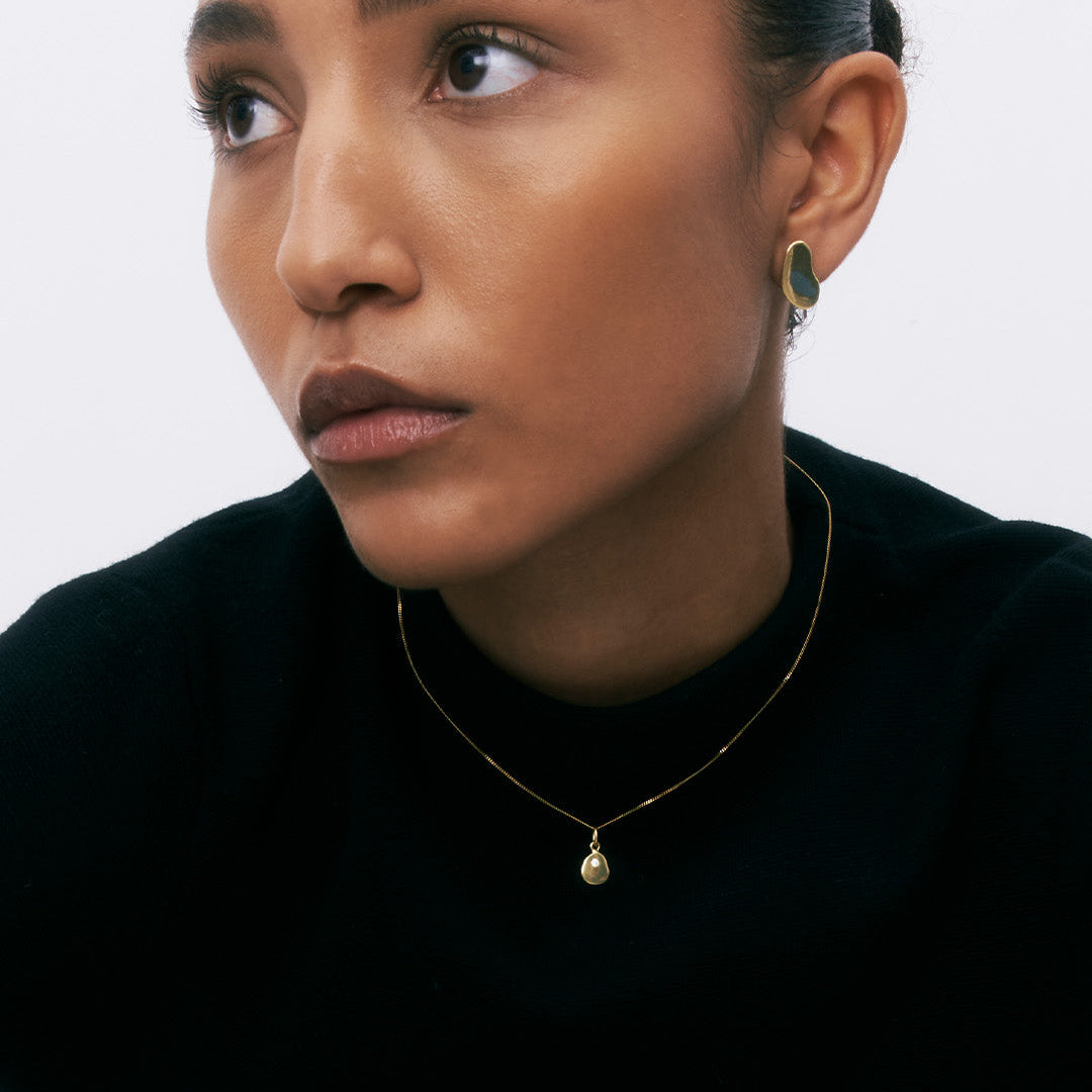 Brincos irregluares de prata 925 com banho de ouro 18K em modelo