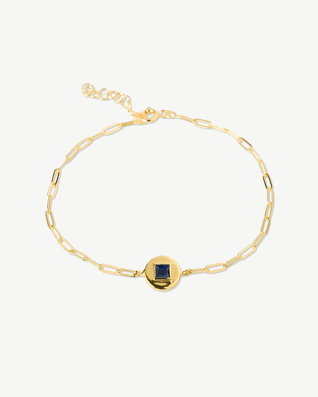 Pulseira em corrente com pingente em prata 925 com banho de ouro 18K e zircónia cúbica azul.