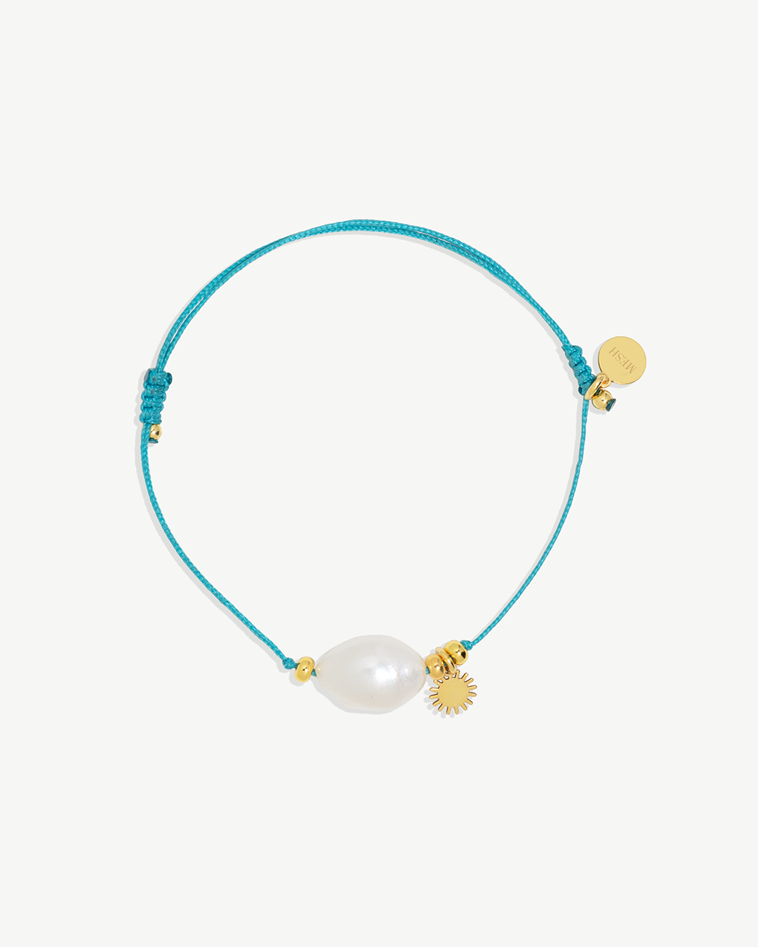 Pulseira em corda com pérola natural