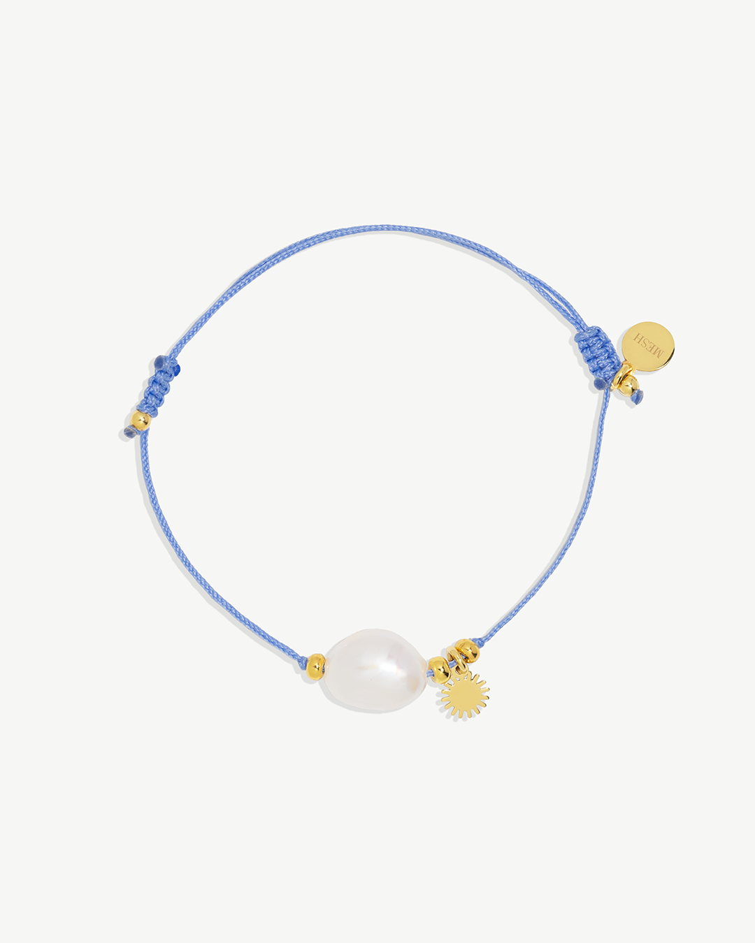 Pulseira em corda com pérola natural