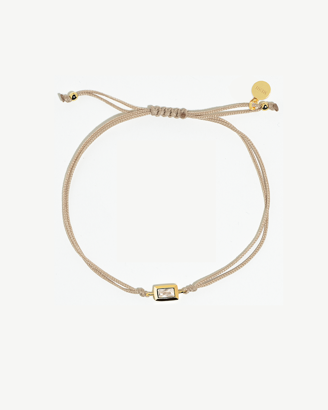 Pulseira ajustável de algodão com detalhe de prata 925 com banho de ouro 18K e zircónia.