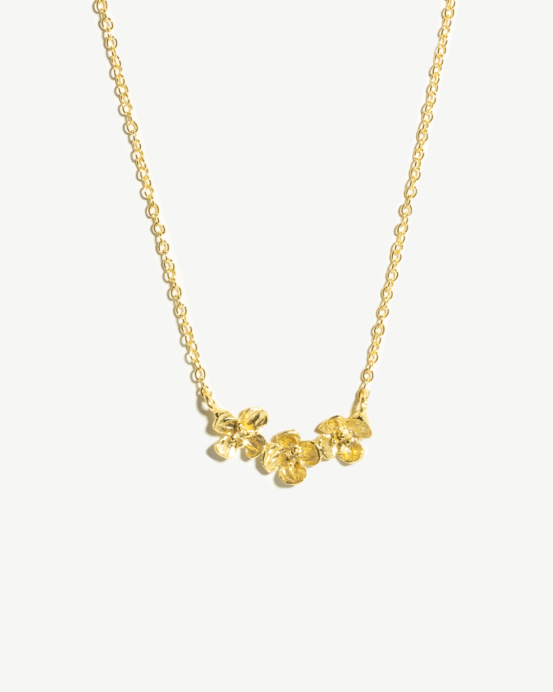 Colar em prata dourada com pendente floral