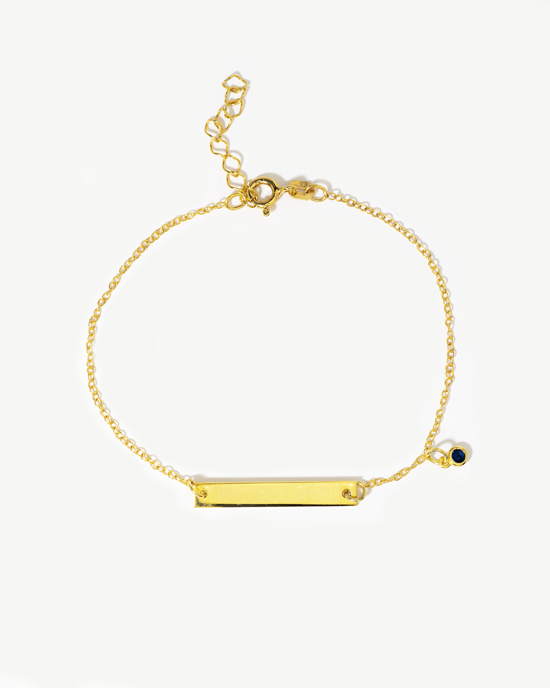 Pulseira com placa personalizável em prata 925 com banho de ouro 18K e zircónia azul.