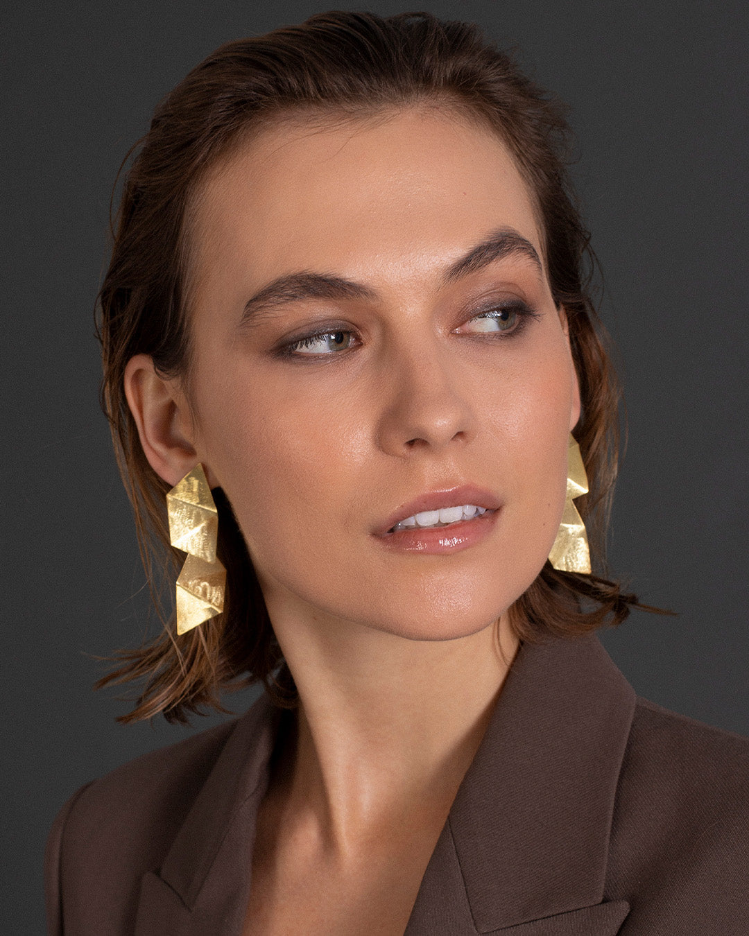 Brincos compridos dourados