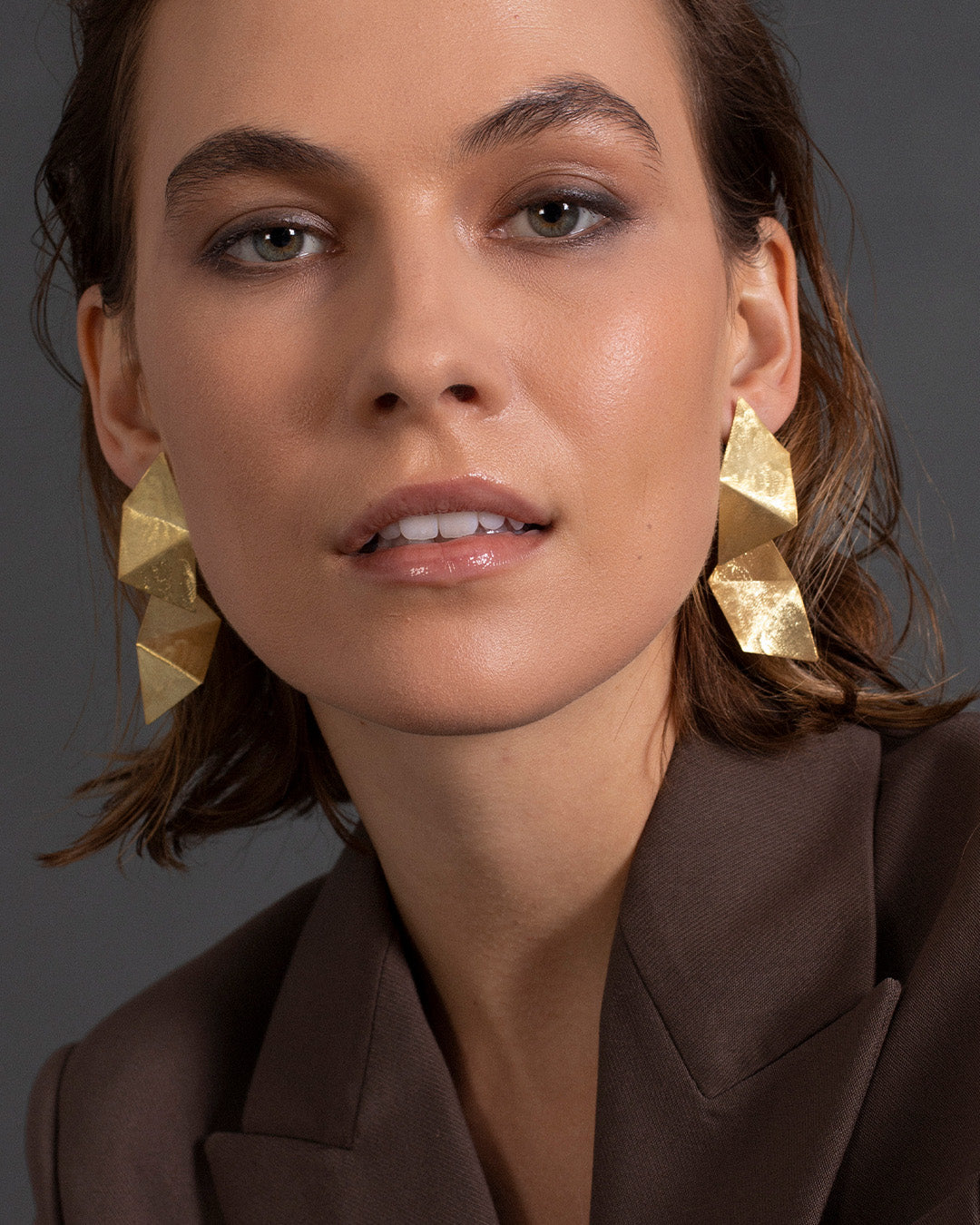 Brincos compridos dourados