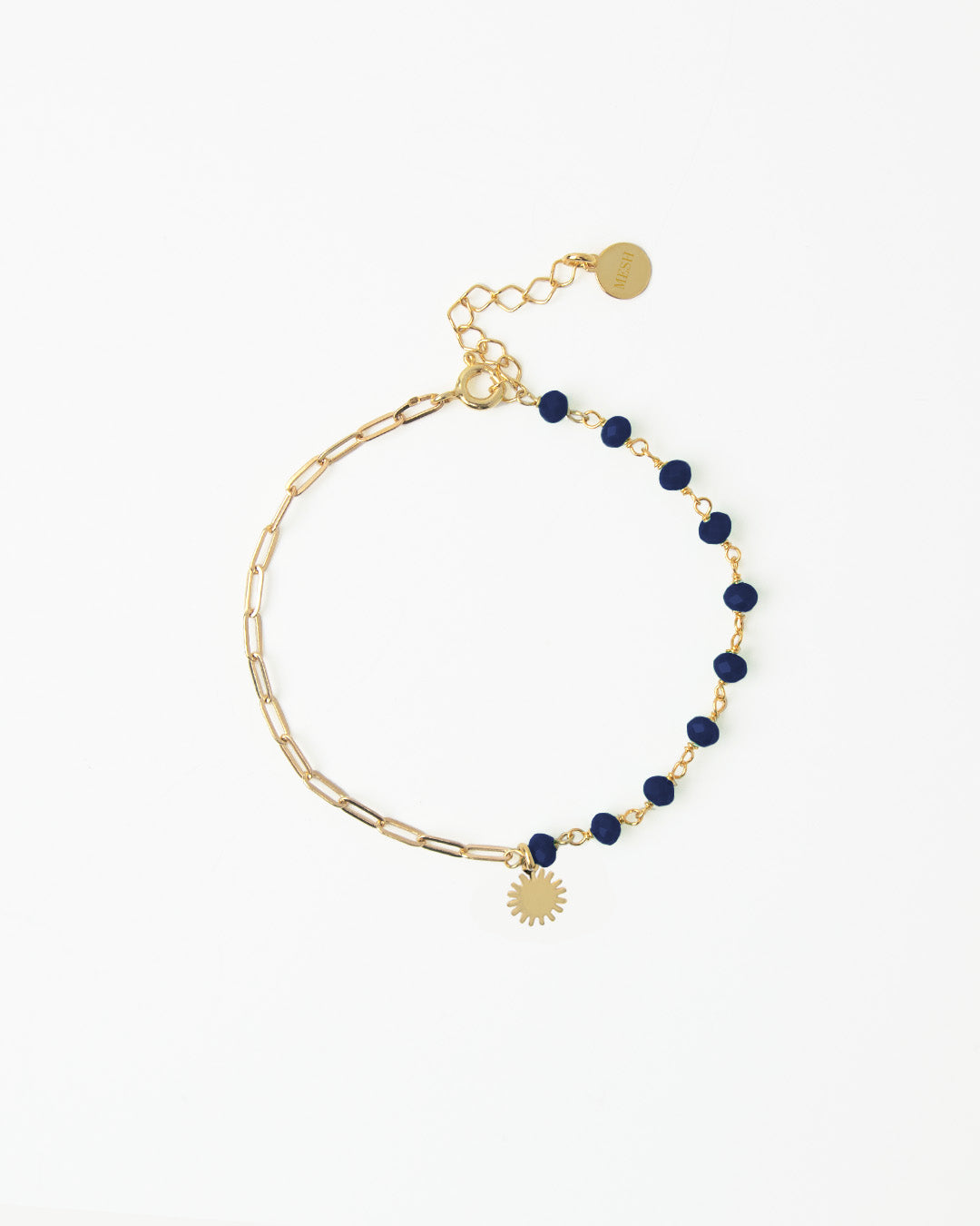 Pulseira em prata dourado com pedras azuis