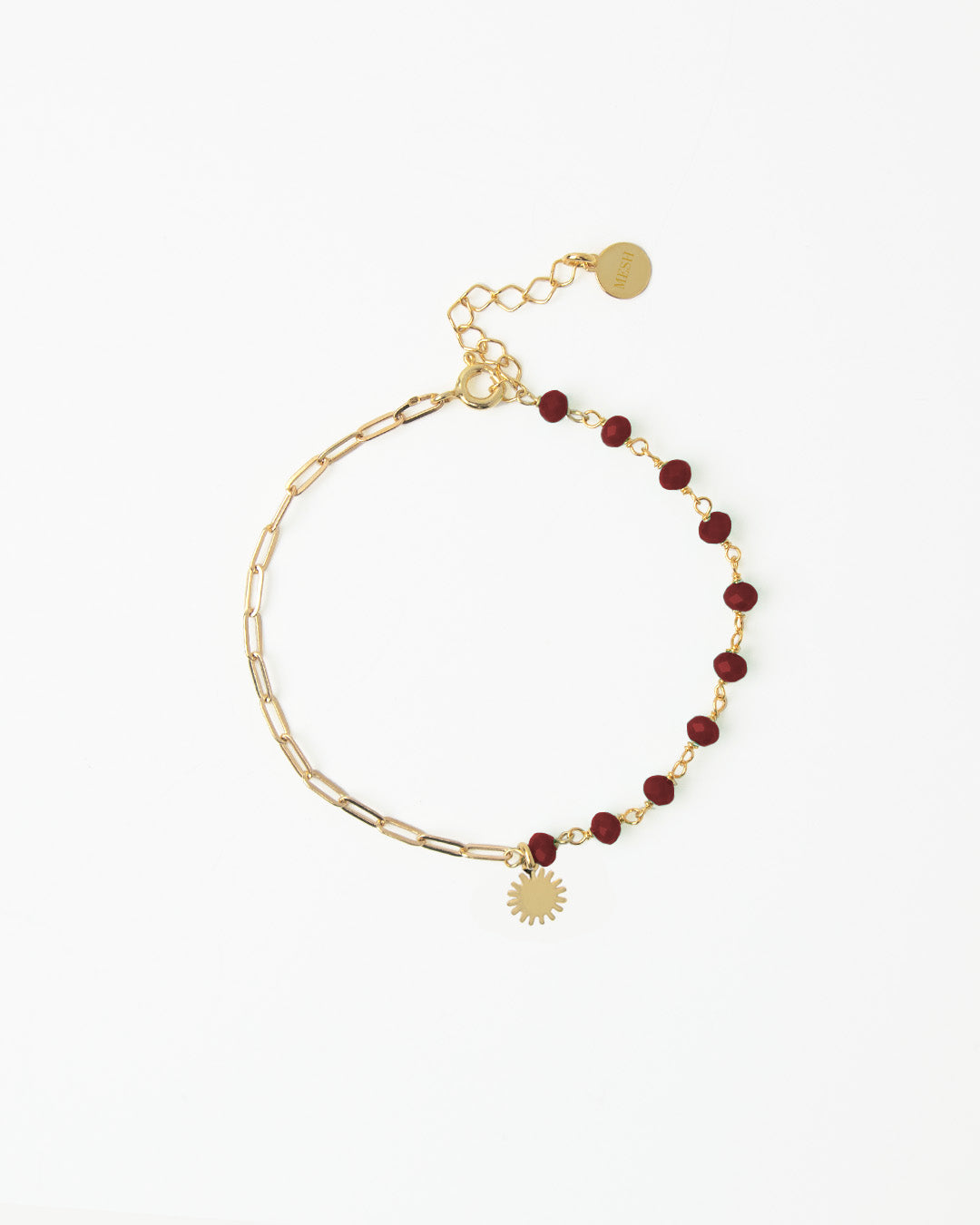 Pulseira em prata dourado com pedras vermelhas