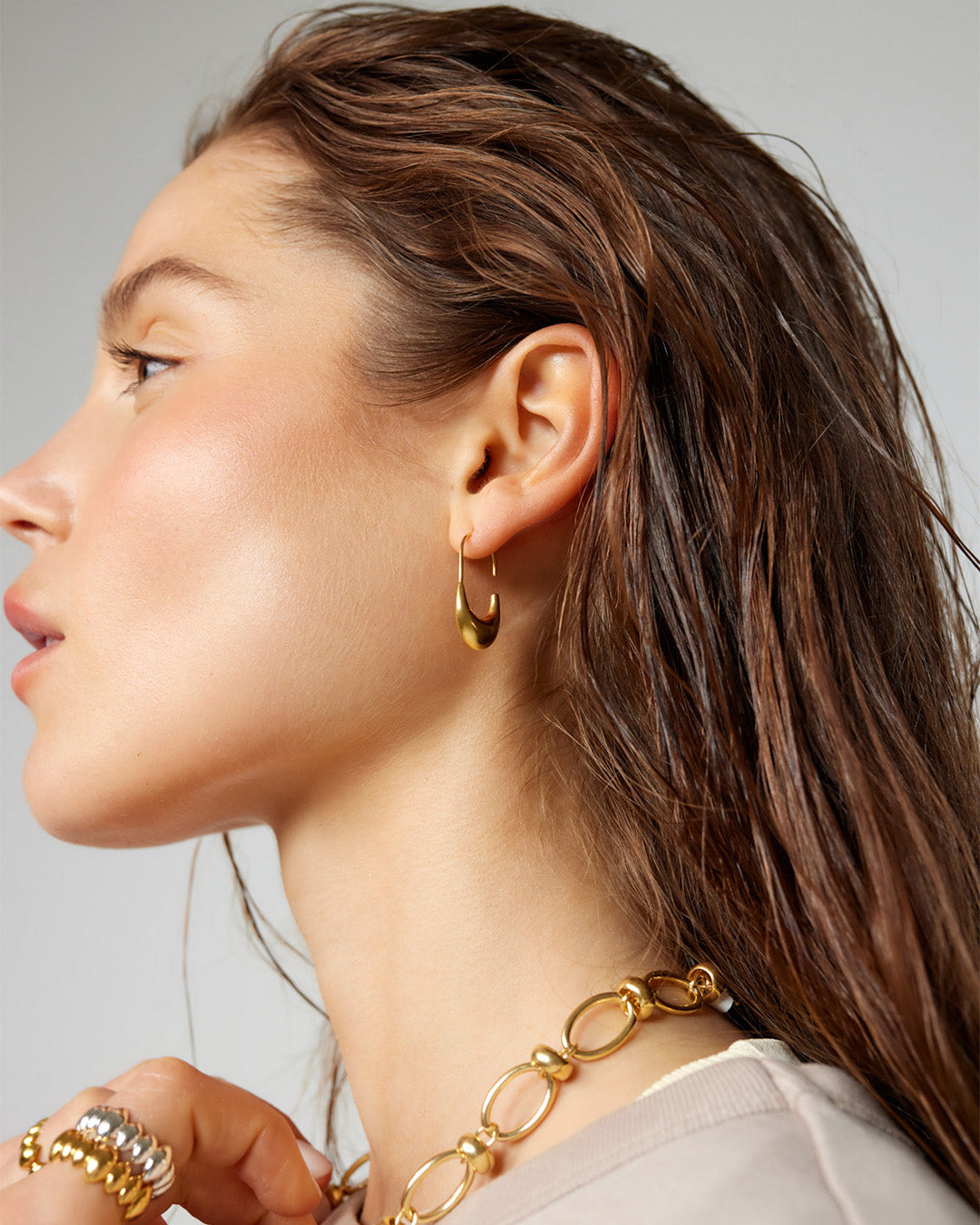 Brincos abertos dourados