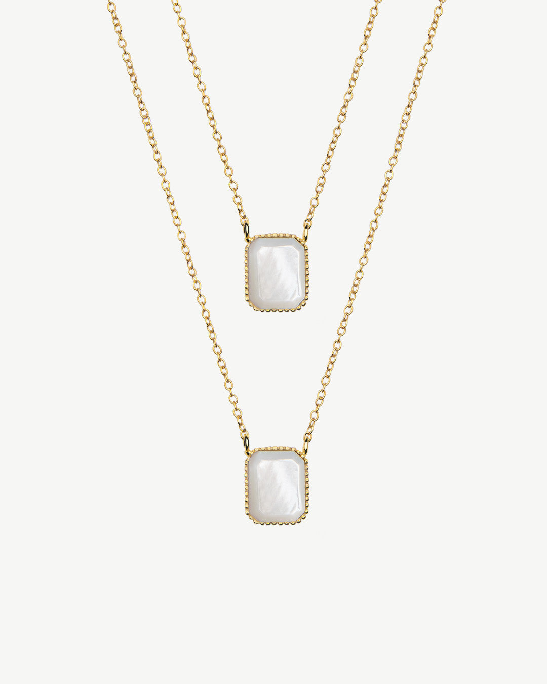 Escapulario em prata dourado com madreperola