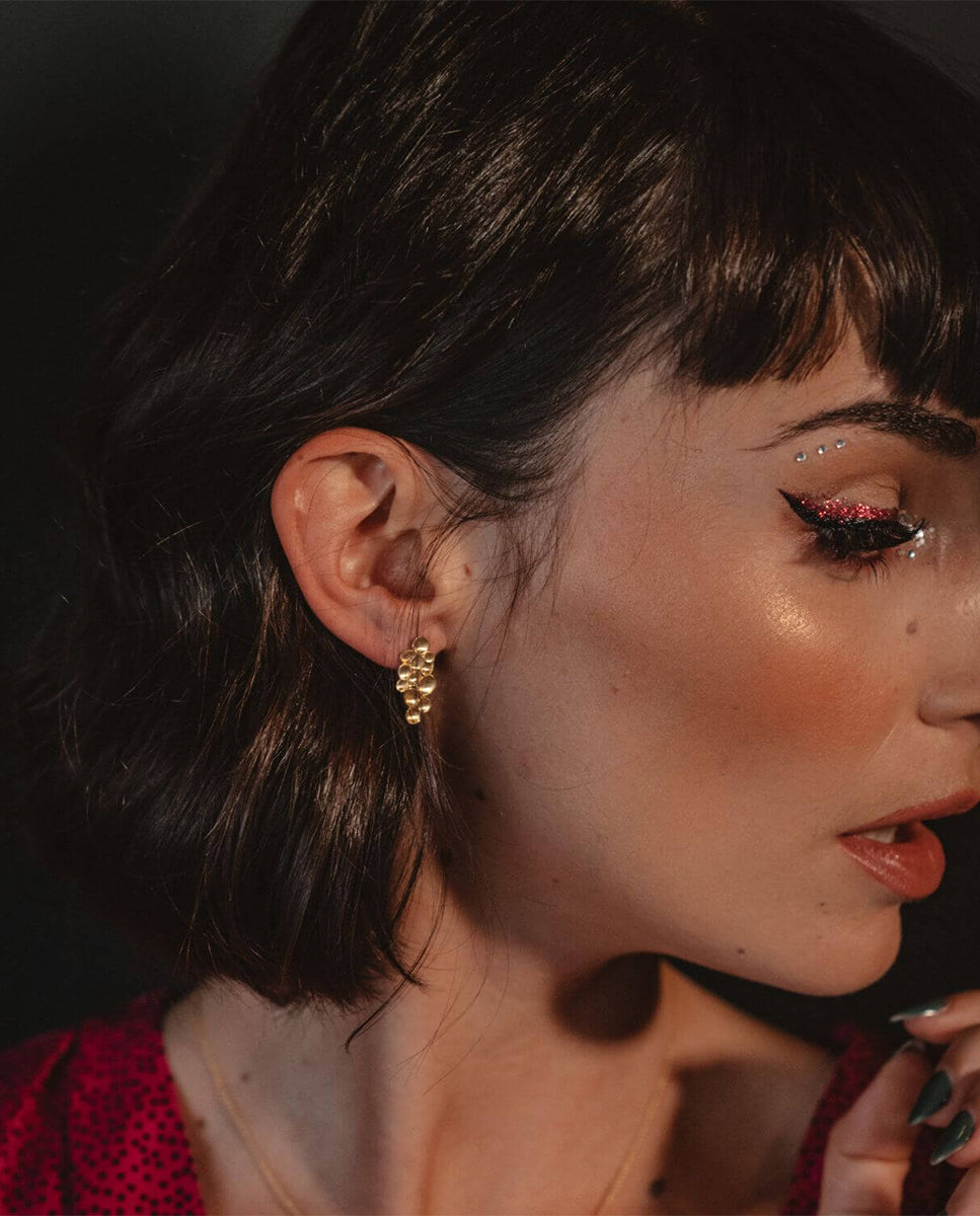 Brincos relevo dourados