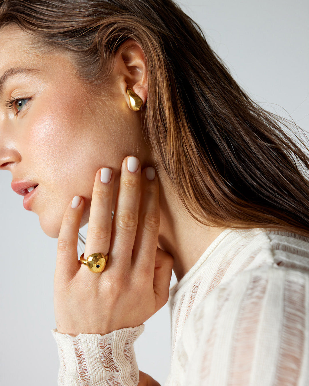 Anel dourado com zirconia