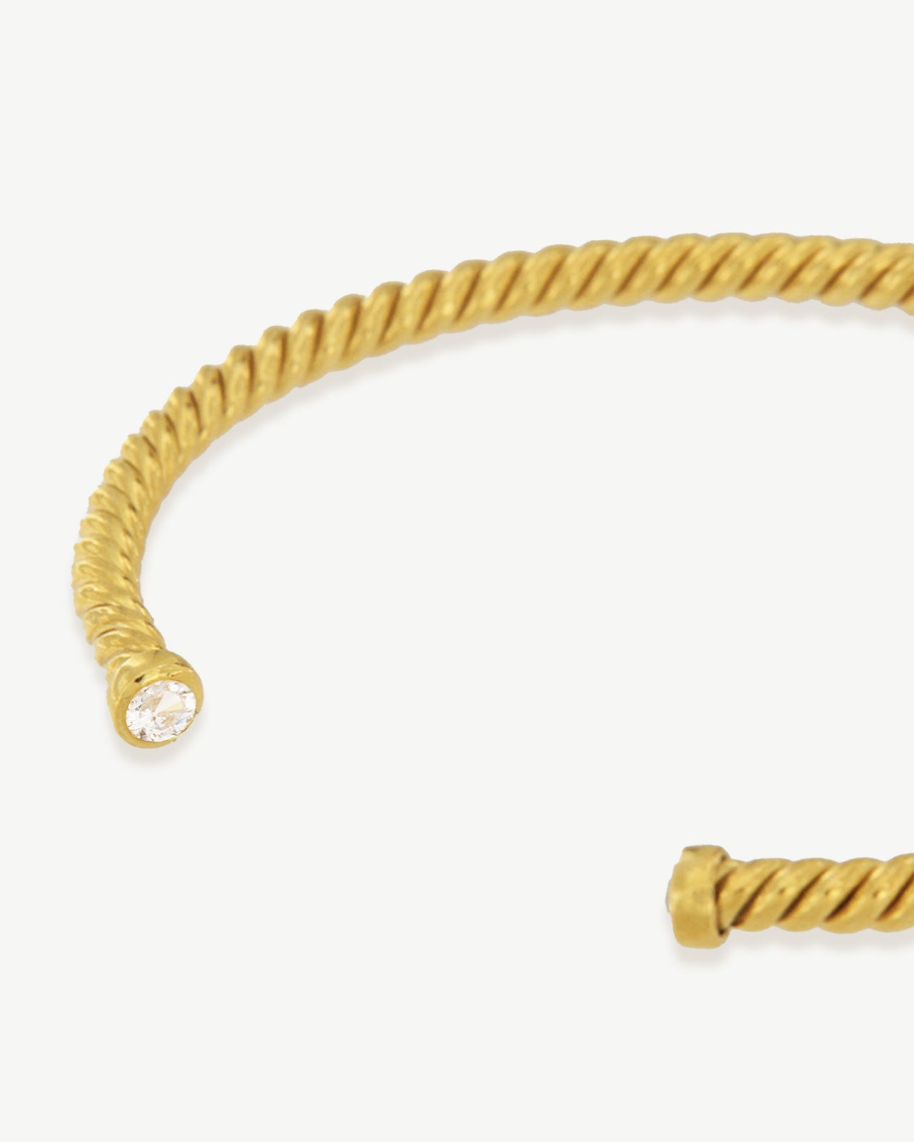 Escrava Arni dourada com zirconia