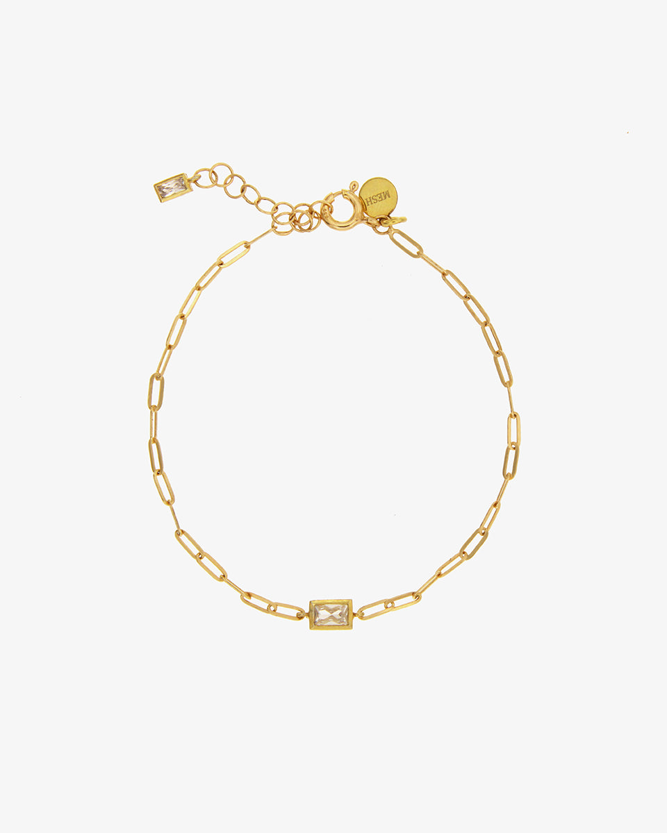 Pulseira dourada com zirconia