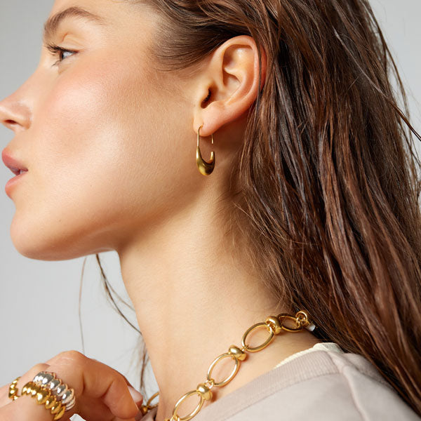 Brincos abertos dourados