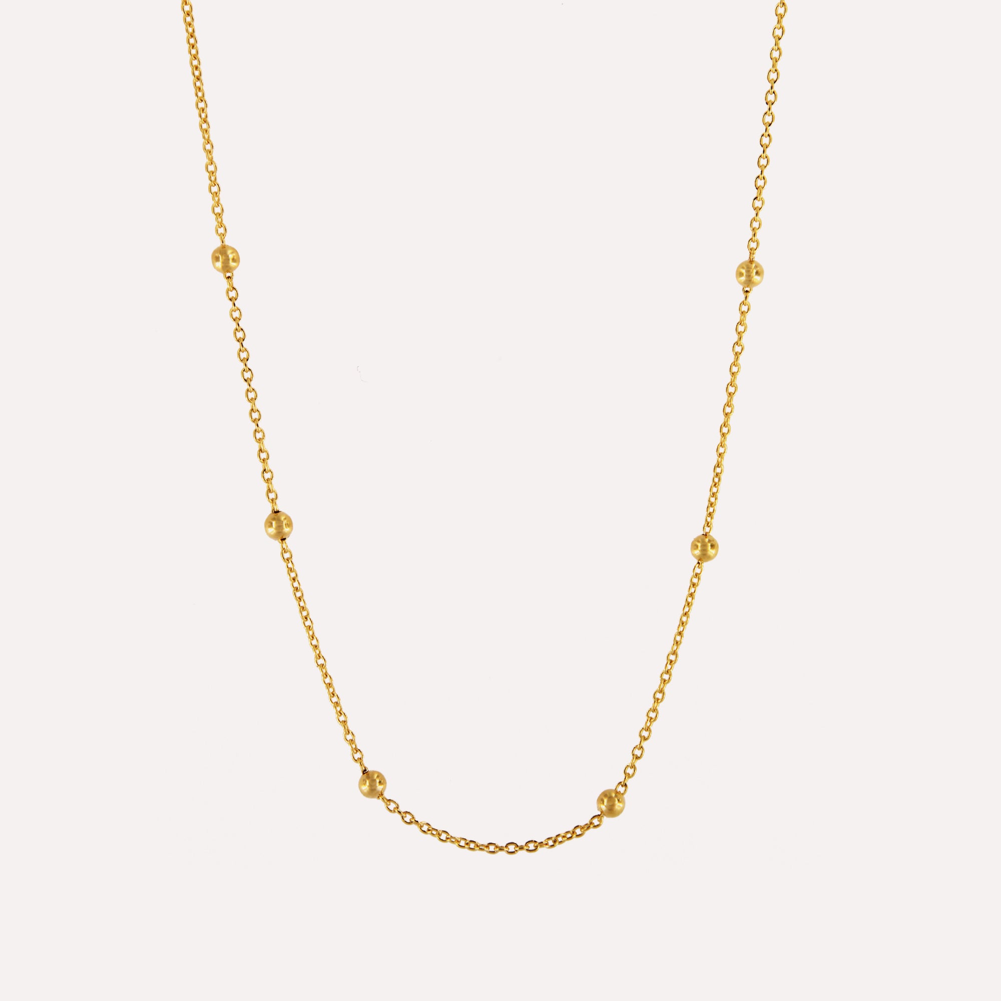 Fio com bolinhas em prata dourada