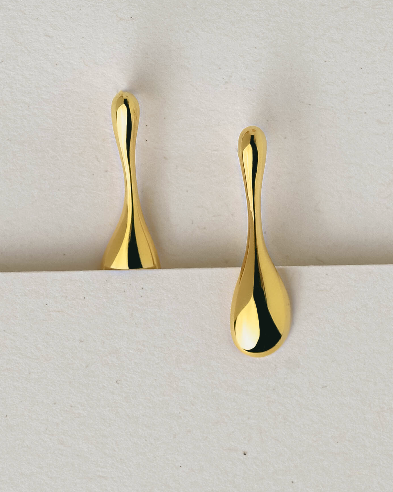 Brincos Flow em prata 925 com banho de ouro 18K