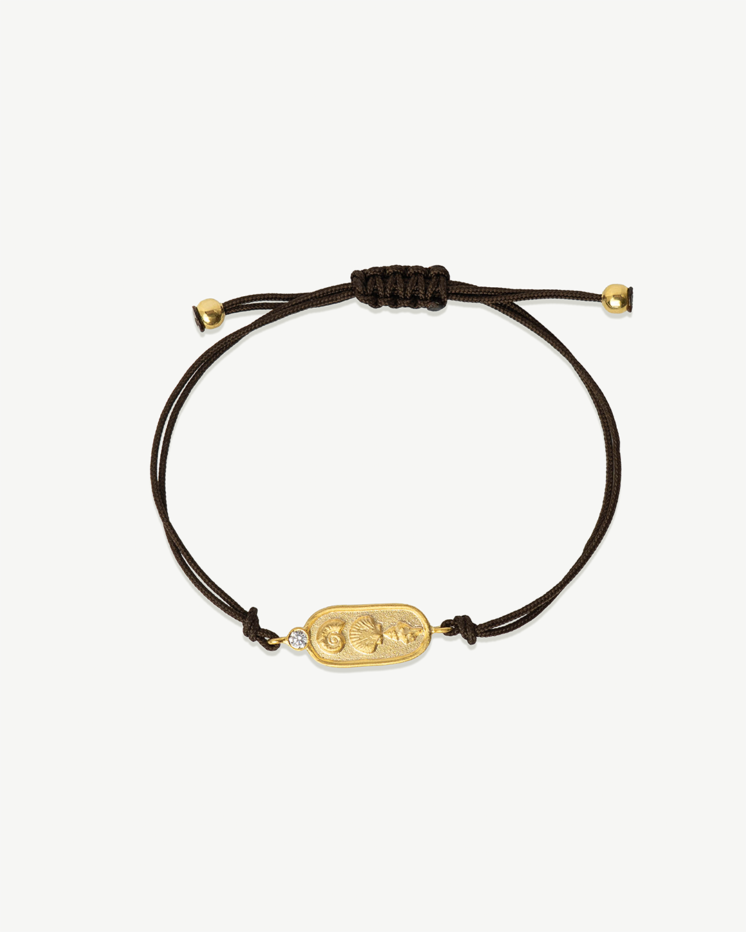 Pulseira regulável com detalhe de prata 925 com banho de ouro 18K e zircónia cúbica.