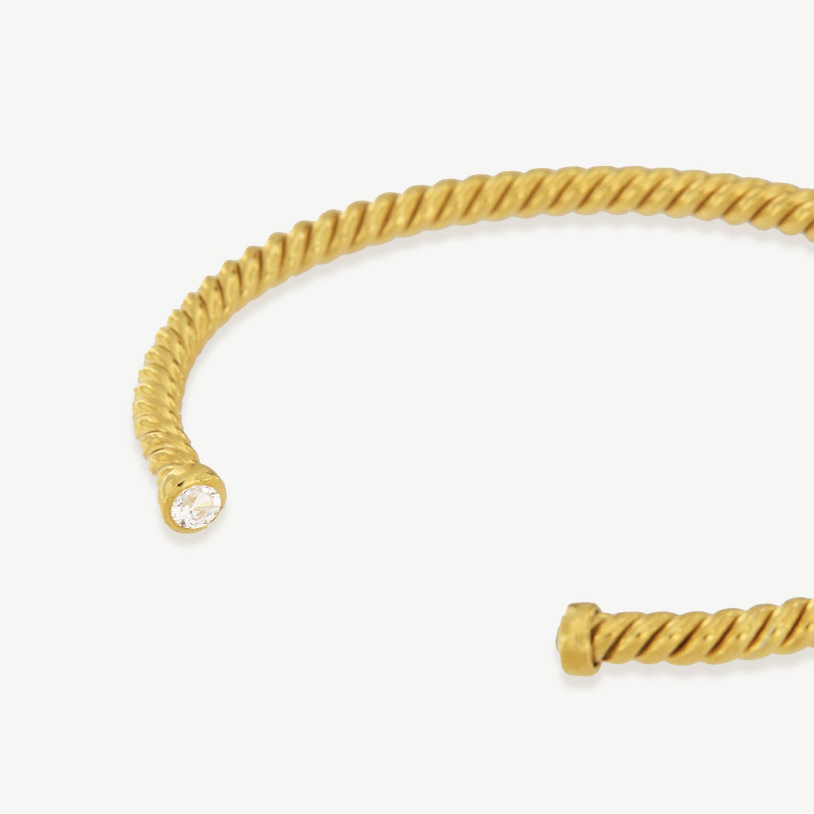 Escrava Arni dourada com zirconia